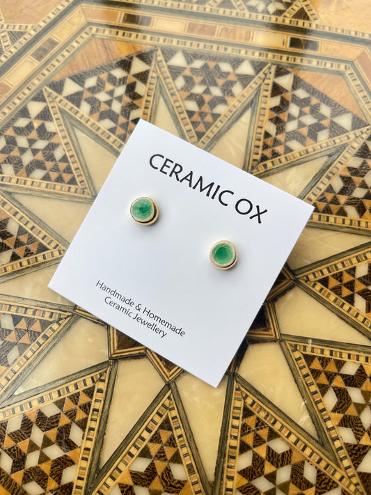 Tiny green glass studs