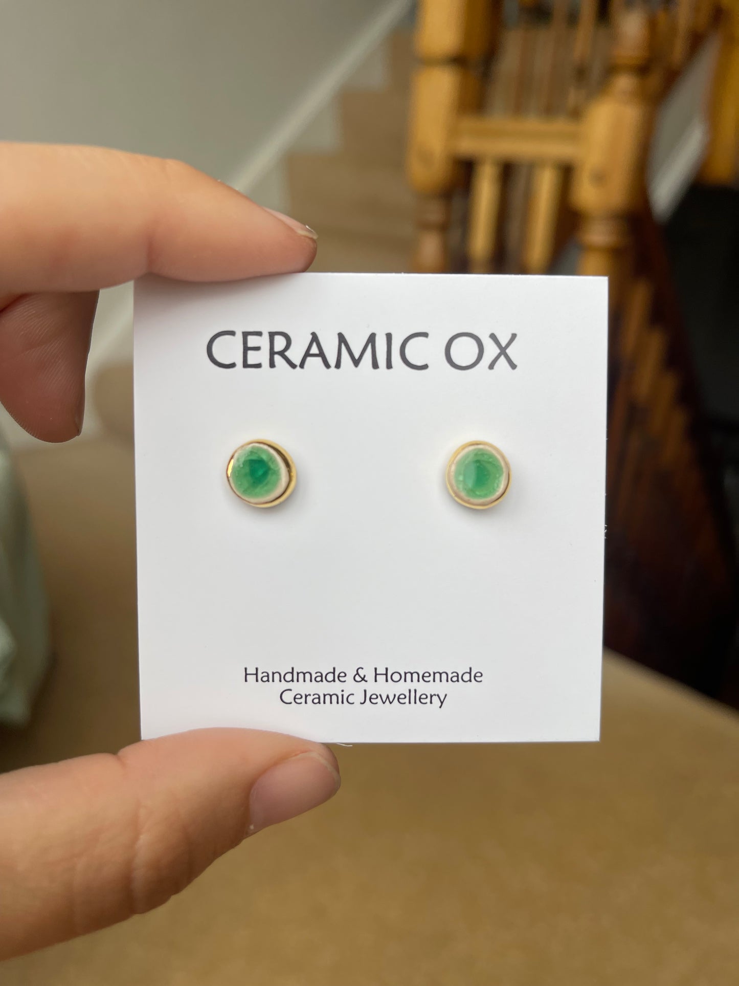 Tiny green glass studs