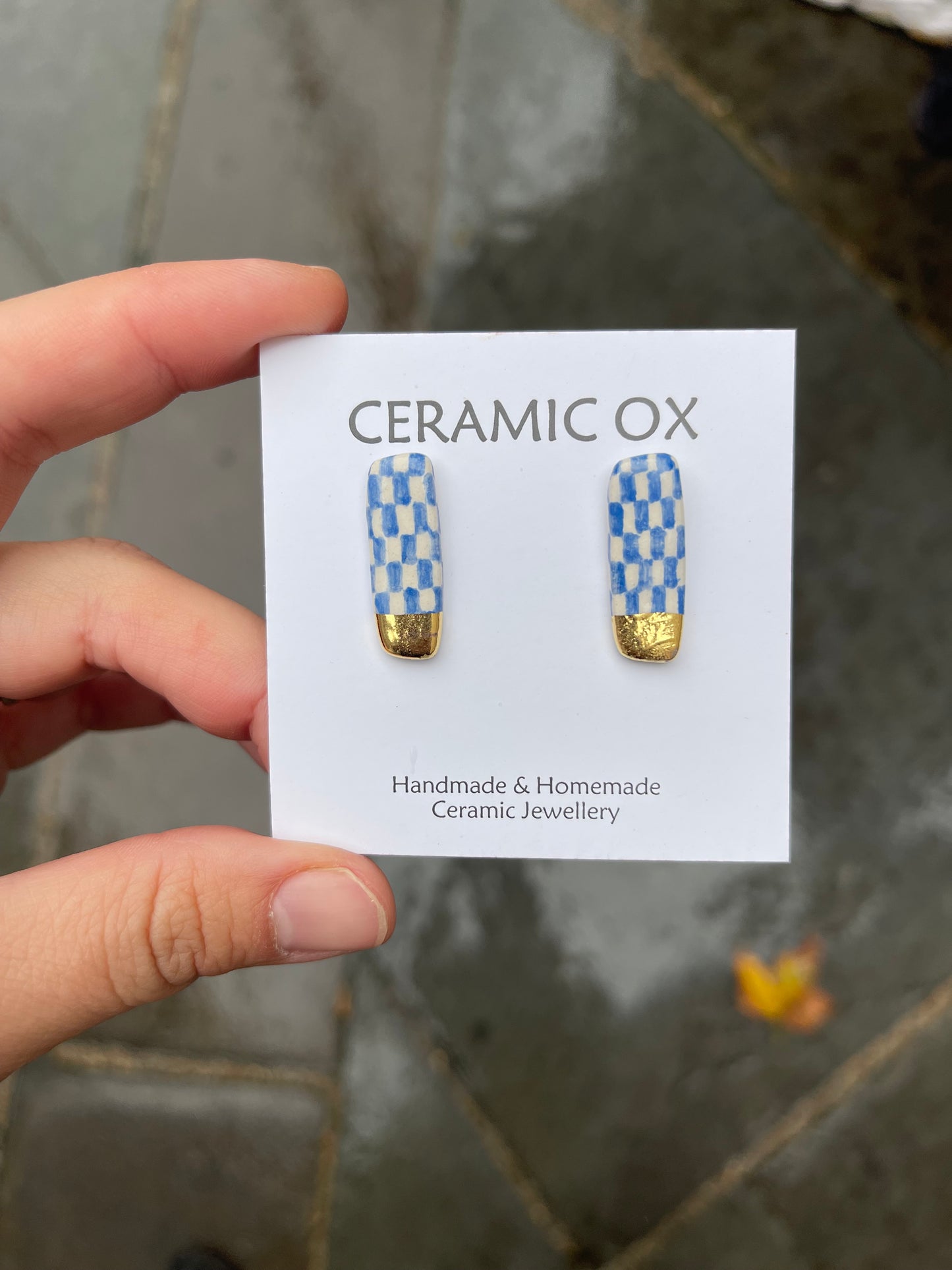 Blue checkered bar studs